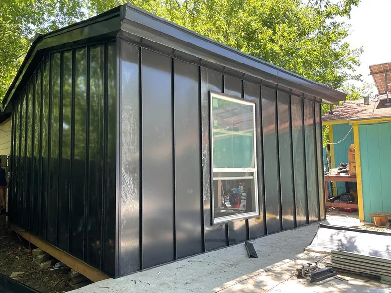 Black standing seam metal wall panels for Metal Roof Installation in Johnson City