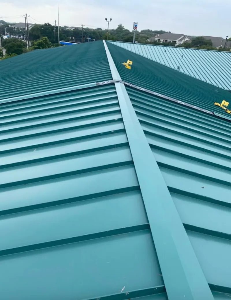 Green commercial metal roof ridge and valley for Metal Roof Repair in Johnson City